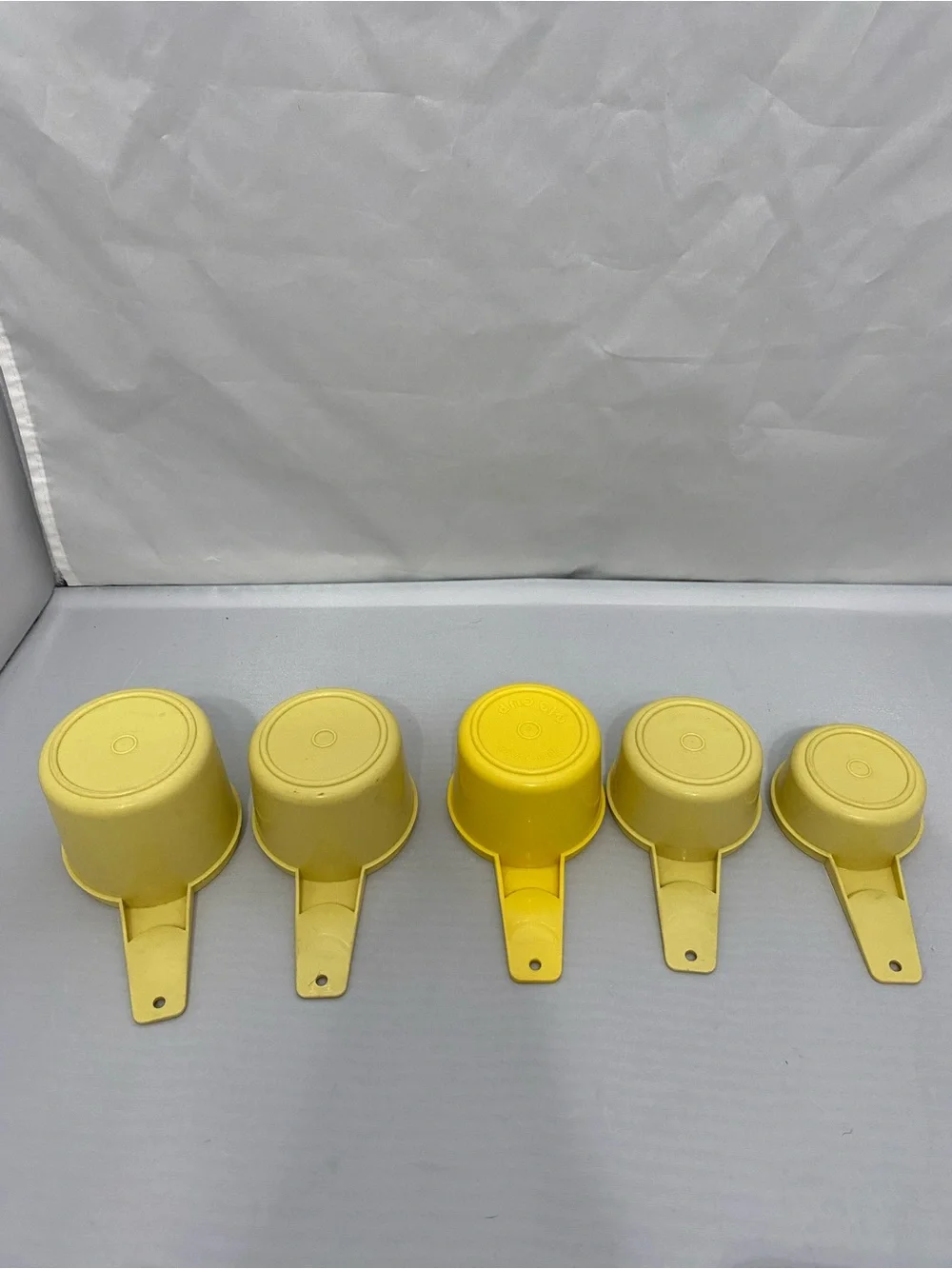 Yellow Plastic Measuring Cups